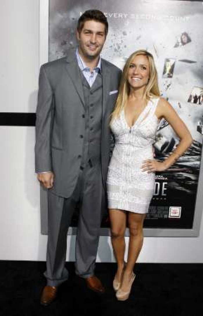 Chicago Bears quarterback Jay Cutler (L) poses with girlfriend, actress Kristin Cavallari, at the premiere of the film 'Source Code' in Hollywood, California March 28, 2011. REUTERS/Fred Prouser (UNITED STATES - Tags: ENTERTAINMENT SPORT FOOTBALL)