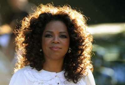 U.S. television presenter Oprah Winfrey arrives for the birthday dinner party of former president of South Africa Nelson Mandela at Hyde Park in London June 25, 2008.