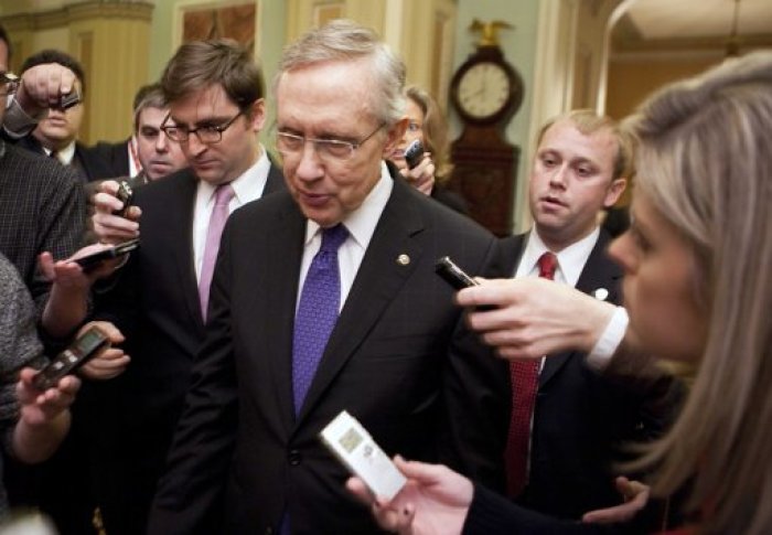 Senate Majority Leader Harry Reid (D-NV) speaks to reporters about an agreement on the payroll tax holiday on Capitol Hill in Washington on December 16, 2011.