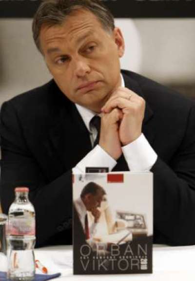 Hungary's Prime Minister-elect and Fidesz party Chairman Viktor Orban attends the launch of a photo book in Budapest by Hungarian photographer Burger Barna April 29, 2010. The book documents Orban's ascent to power.