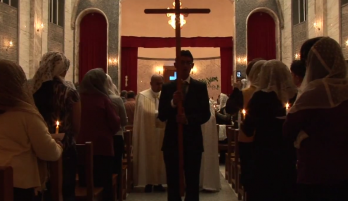 Assyrian Christians are seen in Iraq during a service, in this still image taken from 'Mourning in the Garden of Eden,' a feature-length documentary film by Gwendolen Cates currently in post-production.