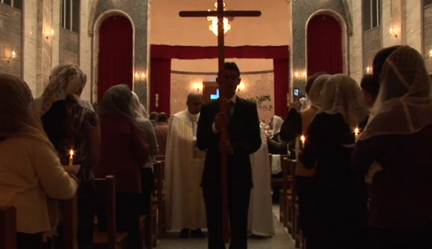 Assyrian Christians are seen in Iraq during a service, in this still image taken from "Mourning in the Garden of Eden," a feature-length documentary film by Gwendolen Cates currently in post-production.