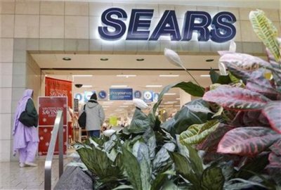 Customers walk into a Sears store at Fair Oaks Mall in Fairfax, Virginia, January 7, 2010.