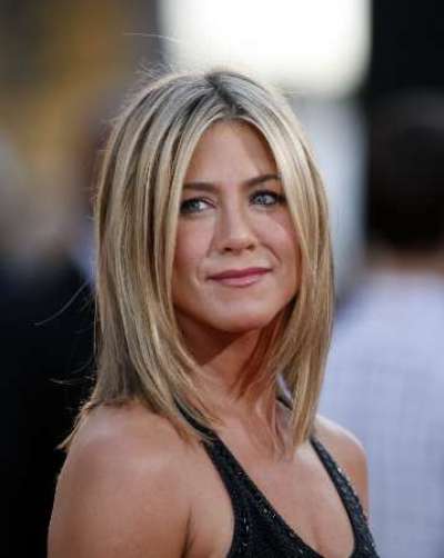 Cast member Jennifer Aniston poses at the premiere of 'Horrible Bosses' at the Grauman's Chinese theatre in Hollywood, California June 30, 2011. The movie opens in the U.S. on July 8.