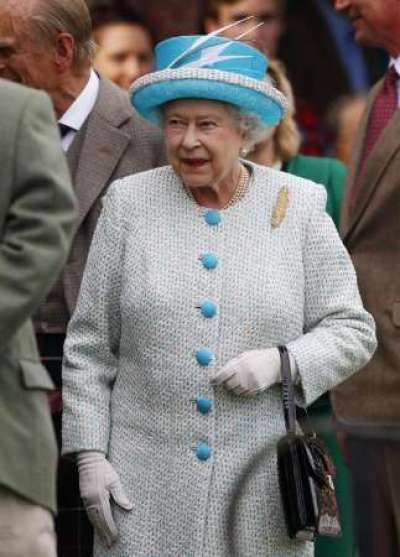 Britain's Queen Elizabeth arrives to the Braemar Royal Highland Gathering in Scotland September 3, 2011.