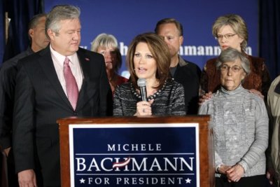 Republican presidential candidate Michele Bachmann announces she is dropping out of the race in West Des Moines, Iowa January 4, 2012. U.S. congresswoman Bachmann on Wednesday ended her campaign to become the 2012 Republican U.S. presidential candidate and called on supporters to rally behind the party's eventual nominee. The announcement came a day after she received only 5 percent of the vote in the Iowa nominating caucuses, dealing what many saw as a fatal blow to her presidential ambitions. At left is her husband Marcus and at right is her mother Jean.