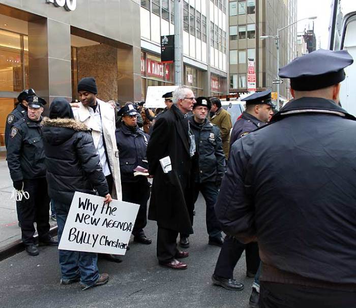 Dimas Salaberrios (L), pastor of Infinity Church in the Bronx borough of New York City, is led away by a police officer Jan. 5, 2012, after being arrested during a protest outside the offices of the New York City Law Department in downtown Manhattan. Salaberrios and supporters rallied against Infinity Church's eviction from rental space in the Bronx owned by the New York City Housing Authority.
