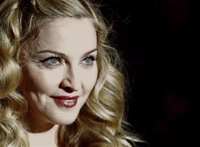 Director Madonna arrives for the gala screening of her film W.E. during the BFI London Film Festival at Leicester Square in London October 23, 2011.