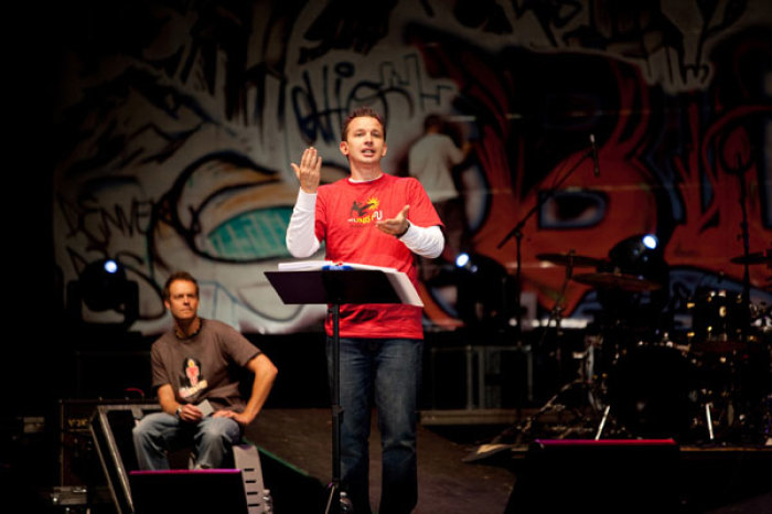 Greg Stier, CEO and founder of Dare 2 Share Ministries, speaks to thousands of youths in this undated photo.