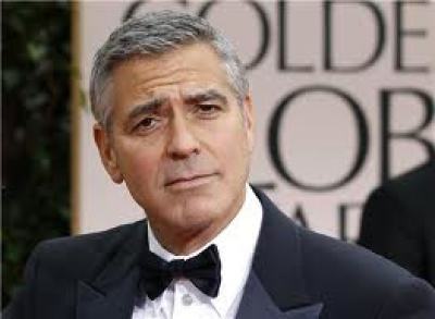 Actor and director George Clooney arrives at the 69th annual Golden Globe Awards in Beverly Hills, California January 15, 2012.