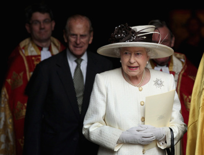 Britain's Queen Elizabeth and her husband Prince Philip (2nd L) leave a service to commemorate the 400th Anniversary of the King James Bible at Westminster Abbey in central London November 16, 2011.