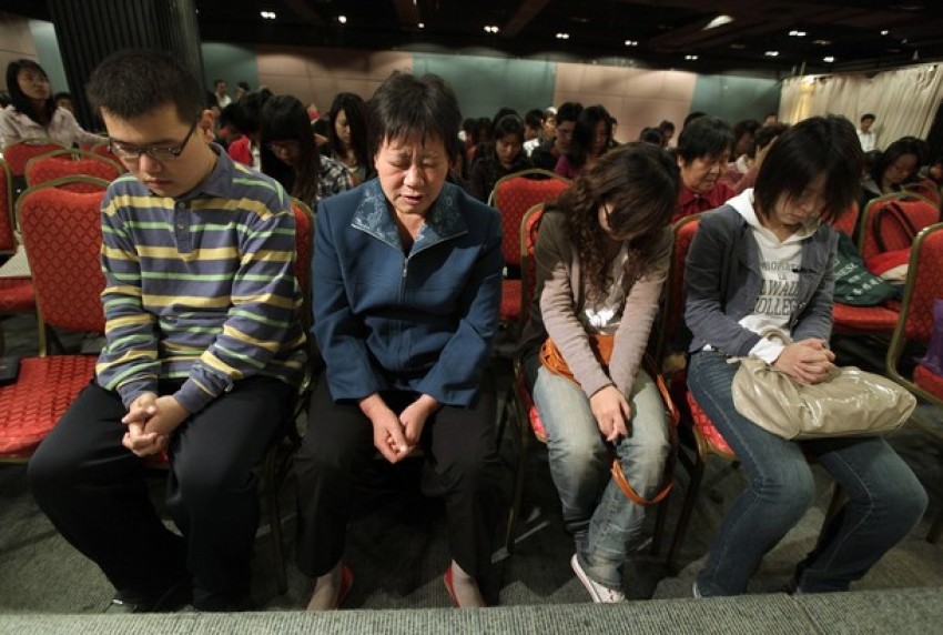 Christians attend a Sunday service at Shouwang Church in Beijing's Haidian district, in this Oct. 3, 2010, file photo. Shouwang is a