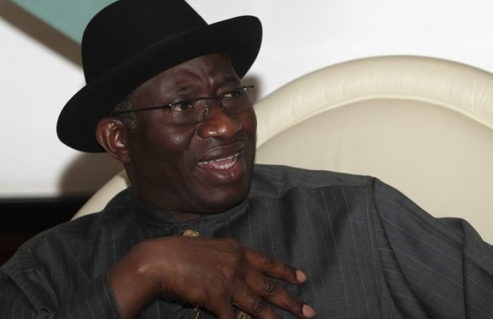 Nigerian President Goodluck Jonathan gestures during an interview with Reuters at the Presidential Villa in Abuja Jan. 26, 2012.