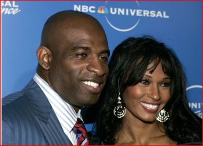 Former NFL player Deion Sanders and his wife Pilar, stars of the Oxygen Network's' 'Deion and Pilar: Prime Time Love', arrive at the NBC Universal Experience as part of upfront week in New York on May 12, 2008. Sanders has said that he will be divorcing Pilar after 12 years of marriage. Photo:REUTERS/Shannon Stapleton