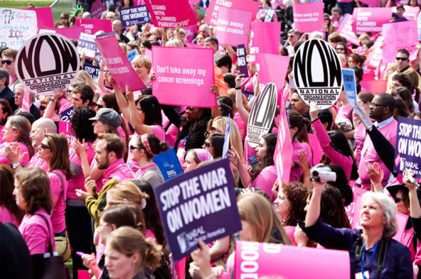 Members of Planned Parenthood, NARAL Pro-Choice America and more than 20 other organizations hold a 