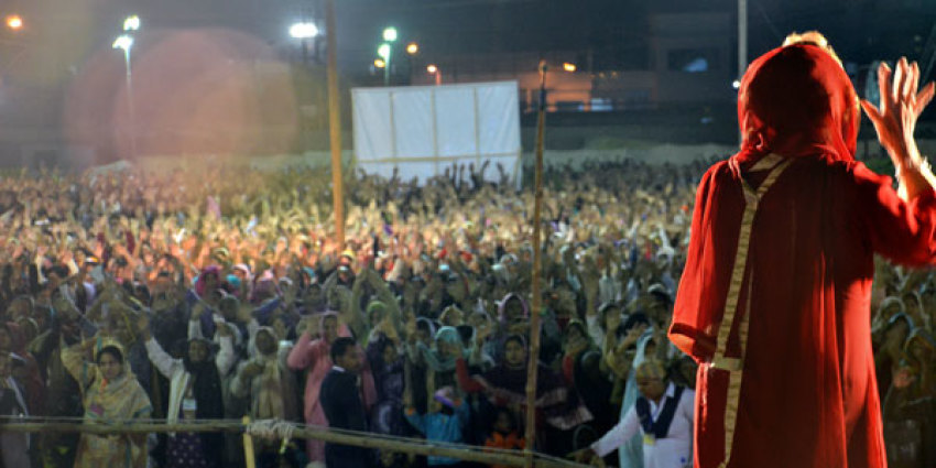 Marilyn Hickey prays with thousands at Karachi, Pakistan "Night of Healing" meetings.