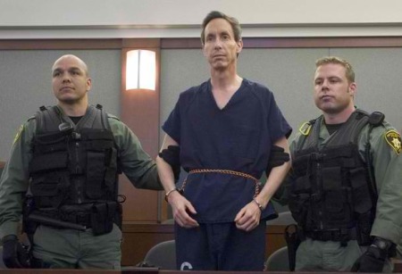 Polygamist Warren Jeffs (C) is flanked by Las Vegas Metro Police SWAT officers during an extradition hearing at the Clark County Regional Justice Center in Las Vegas, Nevada, in this August 31, 2006 file photograph. A Texas jury on August 9, 2011 sentenced polygamist leader Jeffs to life in prison plus 20 years for sexually assaulting two girls he claimed as "spiritual" brides.