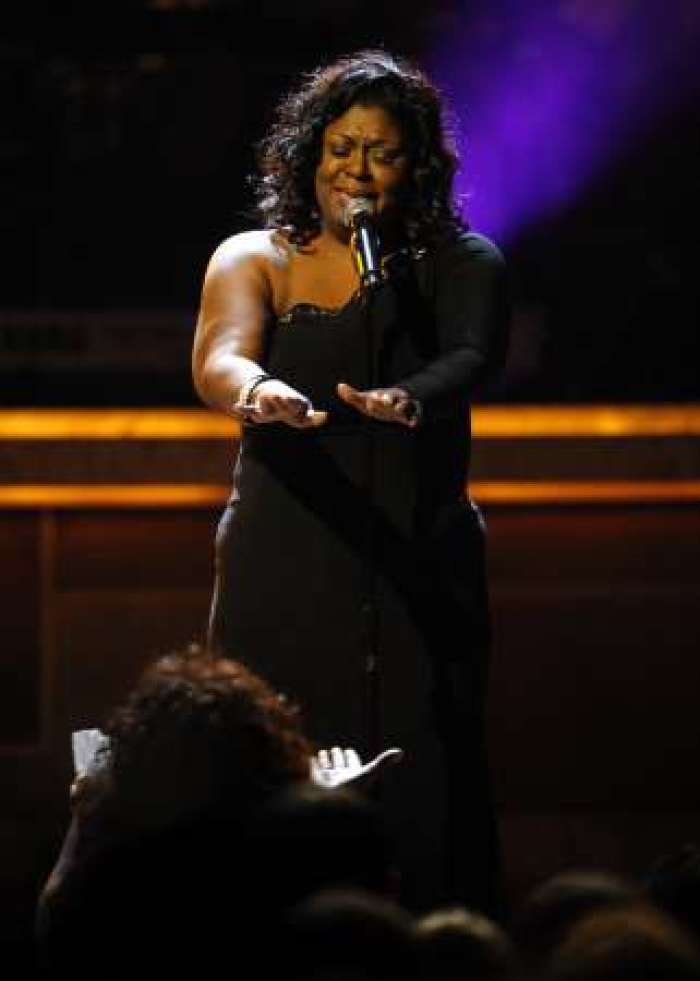 Singer Kim Burrell sings to Whitney Houston to honor her for receiving the BET Honors for Entertainment in Washington, January 16, 2010.