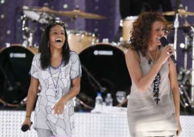 Singer Whitney Houston performs with her daughter, Bobbi Kristina (L), during a taping of Good Morning America on ABC in New York September 1, 2009.