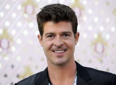 Actor Robin Thicke arrives at Pharrell William's launch for his new liqueur in the Beverly Hills area of Los Angeles, California