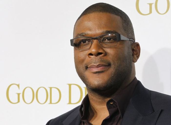 Director and actor Tyler Perry poses at the premiere of his new film 'Good Deeds' in Los Angeles, Calif.