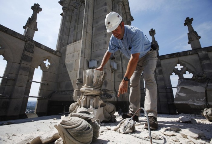Joe Alonso, chief mason at Washington's National Cathedral, attempts to piece together the fallen pieces from a stone spire that collapsed during an earthquake on Aug. 24, 2011. A 5.8 magnitude quake rattled the U.S. East Coast, sending tremors as far as Canada, damaging well-known buildings in the nation's capital and sending scared office workers into the streets. Washington's National Cathedral, host to state funerals and memorial services for many U.S. presidents, suffered damage with three spires in the central tower breaking off. 