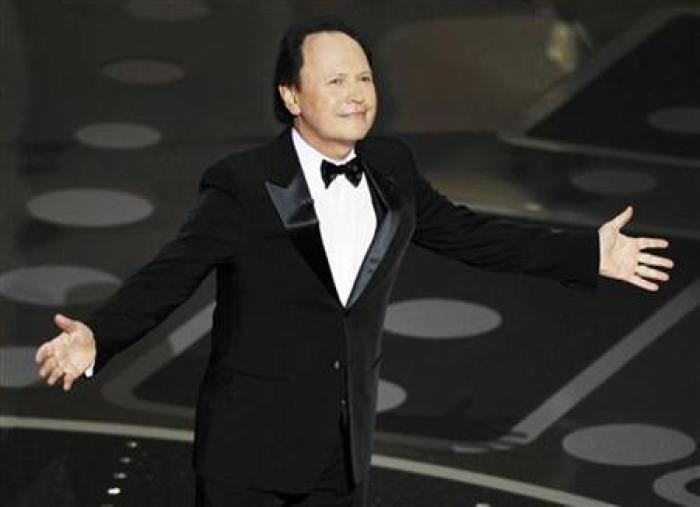 Presenter Billy Crystal stands on stage during the 83rd Academy Awards in Hollywood, Calif., Feb. 27, 2011.
