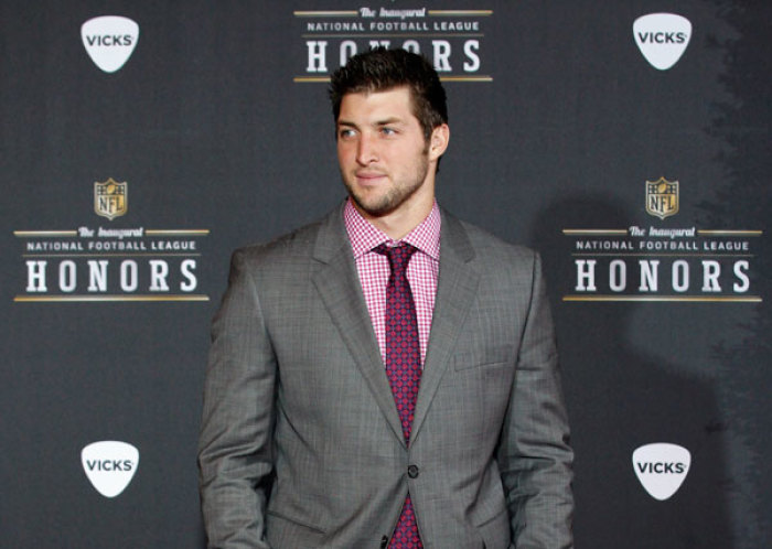 Denver Broncos quarterback Tim Tebow arrives for the Inaugural National Football League Honors at Super Bowl XLVI in Indianapolis, Indiana, February 4, 2012.