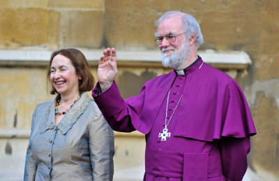Britain's Archbishop of Canterbury Rowan Williams (R) and his wife Jane wave to Queen Elizabeth and Prince Philip after a Diamond Jubilee multi-faith reception at Lambeth Palace in central London February 15, 2012.