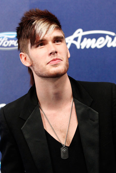 Contestant Colton Dixon poses at the party for the finalists of the television show "American Idol" in Los Angeles, California March 1, 2012.