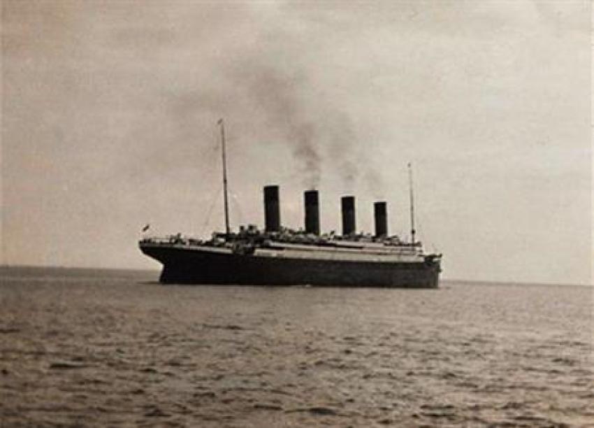 A photo of the Titanic, thought to be the last known image of the ship, as she sets sail from Queenstown for New York. The White Star liner, touted as "unsinkable," sank in 1912 with the loss of 1,523 lives.