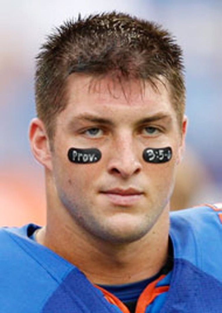 Tim Tebow displaying his religious beliefs with his unique eye black.