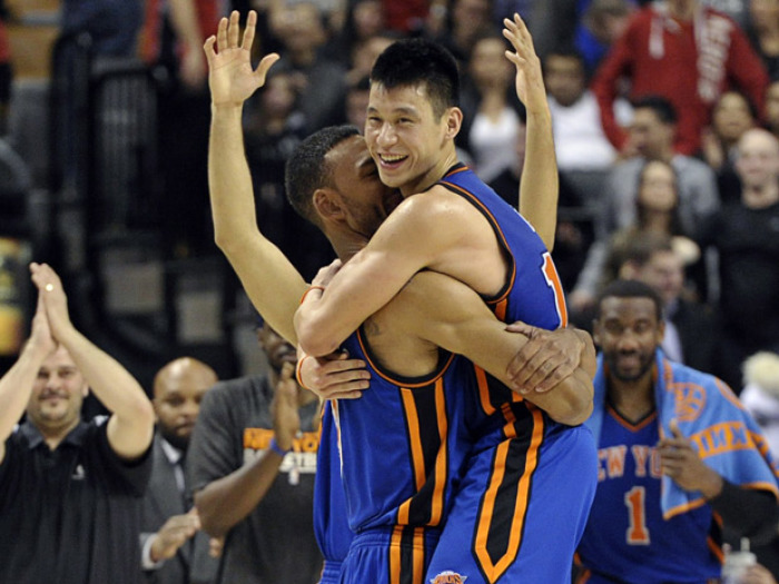 Then New York Knicks player, Jeremy Lin hugs teammate Jared Jeffries after a win in the 2012 season.