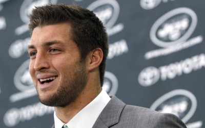 New York Jets quarterback Tim Tebow speaks at a news conference introducing him as a Jets at the team's training center in Florham Park, New Jersey March 26, 2012.