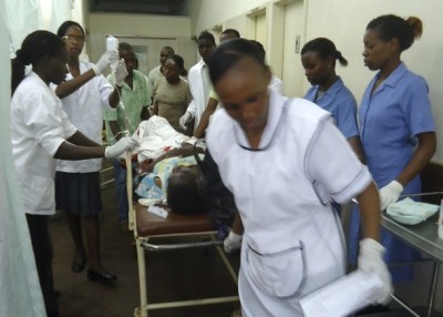 Nurses attend to a victim from a blast at the Coast General Hospital in the Kenyan coastal town of Mombasa on March 31, 2012. Five people were injured in a grenade attack in Mombasa after an earlier explosion near the city injured 10 others Saturday.