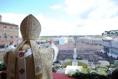 Pope Benedict XVI waves as he makes his 'Urbi et Orbi' (To the city and the world) address from a balcony in St. Peter's Square in Vatican April 8, 2012.