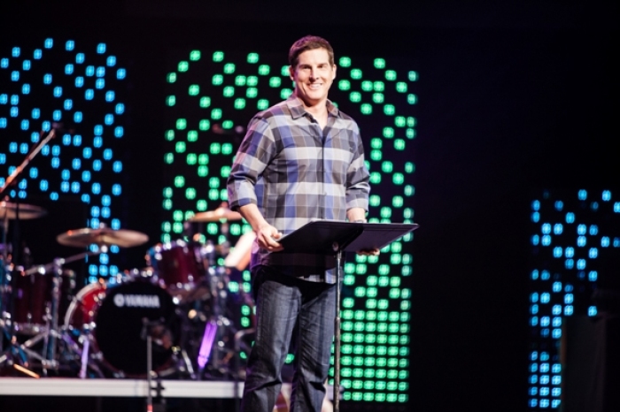 Pastor Craig Groeschel of LifeChurch.tv attempted to bridge the gap between generations inside the church while speaking at Catalyst West conference held at Mariners Church in Irvine, Calif., April 19, 2012.