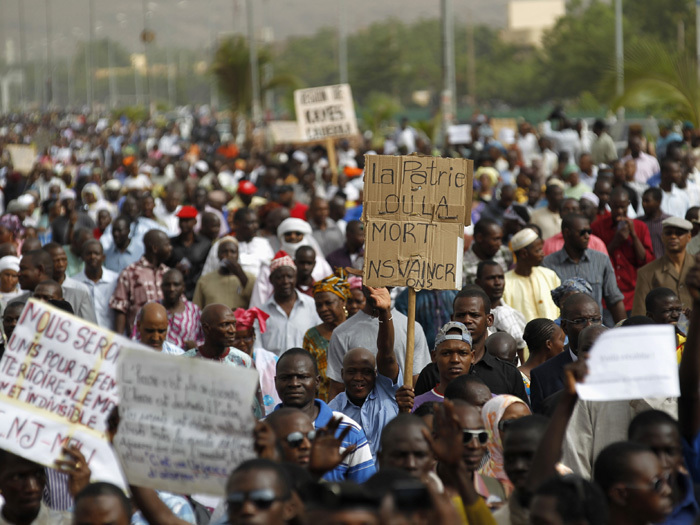 People from northern Mali march against the seizure or their home region by Tuareg and Islamist rebels, in the capital Bamako, April 10, 2012.