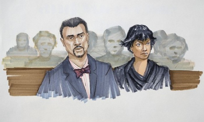 Singer Jennifer Hudson (R) and fiance David Otunga are seen in this courtroom sketch during the start of the murder trial of William Balfour, who is accused of killing three members of Hudson's family, at the Cook County criminal courthouse in Chicago, April 23, 2012.