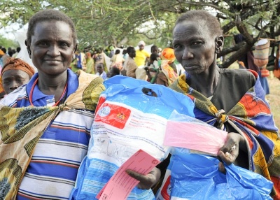 Happy mother's after receiving insecticide treated bed nets.