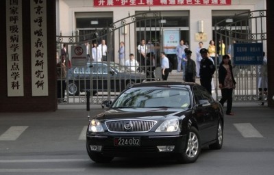 A diplomatic vehicle drives out of an entrance to Chaoyang Hospital, where blind activist Chen Guangcheng was reported to be staying at, in Beijing May 2, 2012.