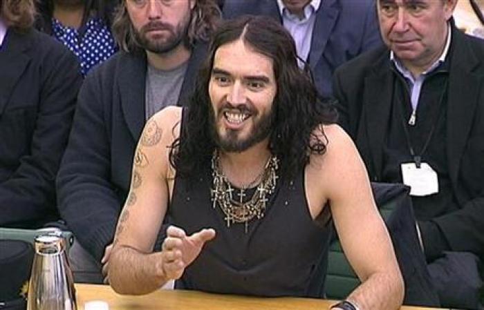 Comedian and actor Russell Brand addresses the House of Commons Home Affairs Committee in this still image captured from video in central London, April 24, 2012.