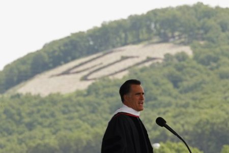 With the letters "LU" on a nearby hillside, Mitt Romney, U.S. Republican presidential candidate and former Massachusetts governor, speaks at the Liberty University commencement ceremony in Lynchburg, Virginia May 12, 2012. Liberty University, founded by the late television evangelist Jerry Falwell, is a bastion for conservative Christian thought.