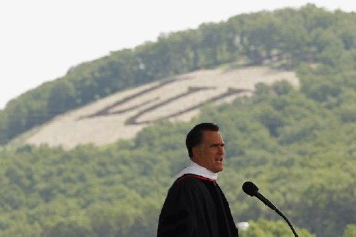 With the letters 'LU' on a nearby hillside, Mitt Romney, U.S. Republican presidential candidate and former Massachusetts governor, speaks at the Liberty University commencement ceremony in Lynchburg, Virginia May 12, 2012. Liberty University, founded by the late television evangelist Jerry Falwell, is a bastion for conservative Christian thought.
