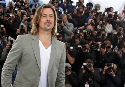 Cast member Brad Pitt attends a photocall for the film ''Killing Them Softly'', by director Andrew Dominik, in competition at the 65th Cannes Film Festival, May 22, 2012.