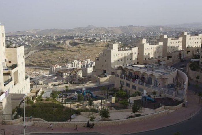 A general view shows Palestinian villages (rear) around a Jewish settlement near Jerusalem known to Israelis as Har Homa and to Palestinians as Jabal Abu Ghneim April 25, 2012. Har Homa is a terraced suburb of neat, white-stone apartments housing 13,000 Israelis that overlooks the biblical town of Bethlehem. Picture taken April 25, 2012.