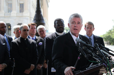 Jim Garlow, senior pastor of Skyline Wesleyan Church in San Diego, answers a question from a reporter about same-sex marriage at a press conference in support of traditional marriage between one man and one woman at a park next to the Capitol building in Washington, D.C. on Thursday, May 24, 2012.