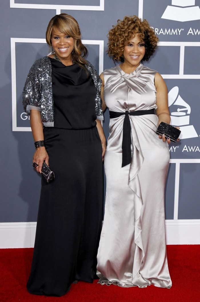 Tina Campbell (L) standing next to sister and Mary Mary group member Erica Campbell (R) at the 54th annual Grammy Awards in Los Angeles California February 12, 2012.