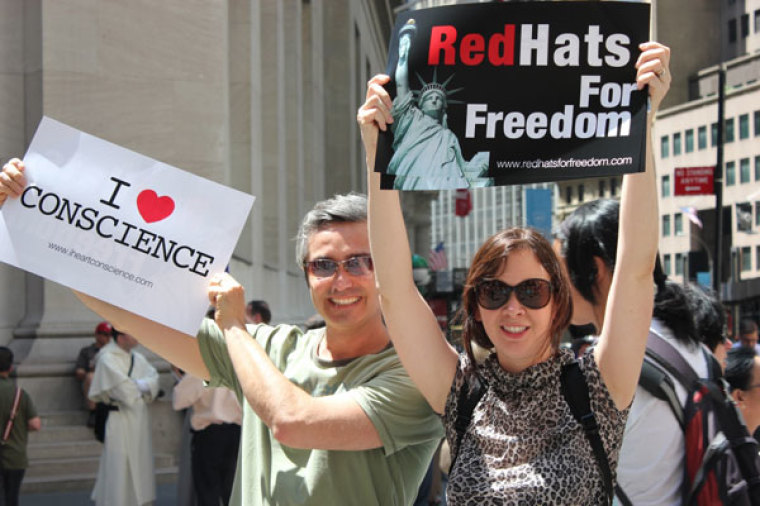 Carlos Bobadilla and Karen Ulliksen of Chile attend the 'Stand Up for Religious Freedom' Rally in New York City on June 8, 2012 to protest the Obama Administration's Health Care mandate.