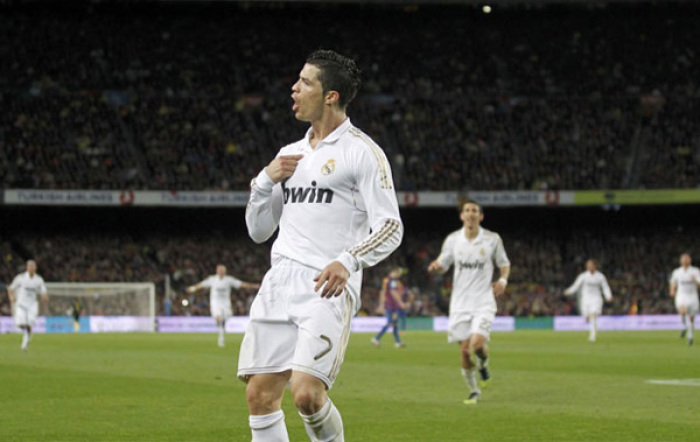 Real Madrid's Cristiano Ronaldo celebrates after scoring their second goal against Barcelona in this file photo.
